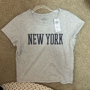HOLLISTER BABY TEE SHIRT (size M)